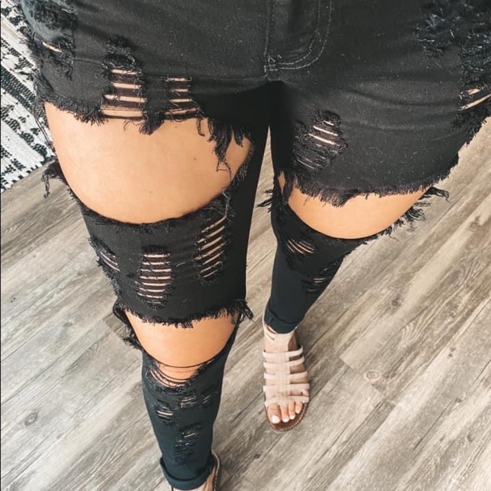 Brand new distressed black jegging style